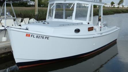 Arch Davis Jiffy V22 Skiff 2011, docked port side view