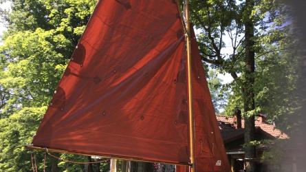 Lilou2 for sale, on trailer, sail up , starboard side stern view