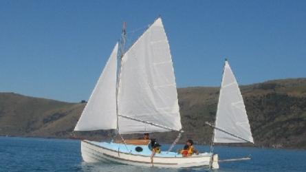 Peter Croft built his Pathfinder with the optional cabin, here he is on New Zealands Akaroa harbour