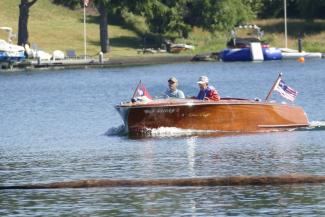 1953 Chris Craft speed boat, underway port side view