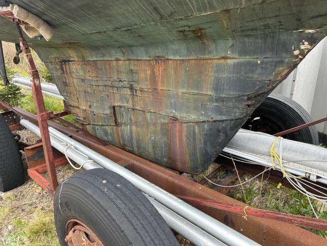 1964 Marconi-rigged 37' Wooden Sailboat, on trailer, up close bottom view