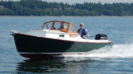 ADELINE at 20+ knots with designer/builder Sam Devlin at the helm.