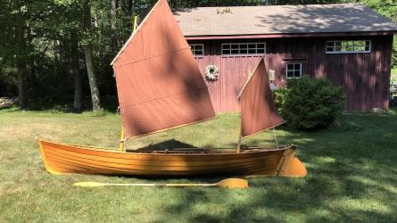 "Piccolo" 12' 8" Sailing Canoe and Model, on the grass, sails up