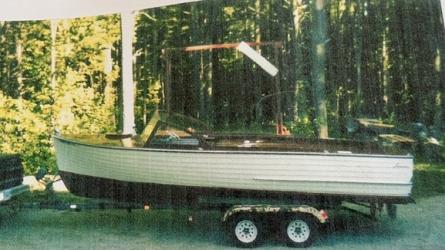 1959 23' Lyman Runabout, on trailer port side view