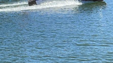 1959 Lyman, underway starboard side view