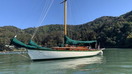 Freelance 38' wooden cutter, in water port side view