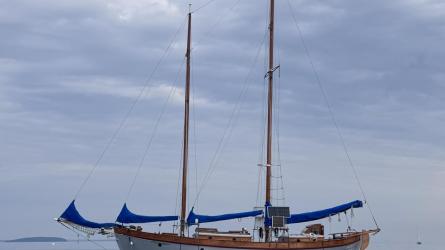52 foot staysail schooner MOONDRIFT, in water moored port side view