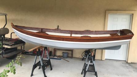 SHELLBACK SAILING DINGHY, on stands inside, port side view