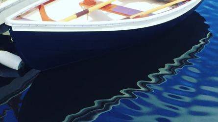 Cottrell Boatbuilding Chaisson Dory, in water port side view