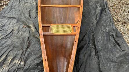 Handcrafted Cedar Strip Canoe- 18 ft, full view, on ground