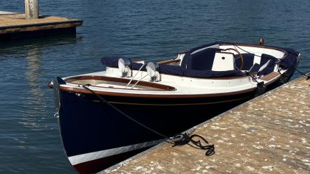 2025 Paul Gartside Custom 17' Electric Launch, in water port side view