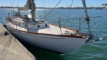 "MERRYWING" A 39' sloop, starboard side bow view, docked