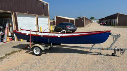 John Welsford Seagull Dory, on trailer starboard side view no cover