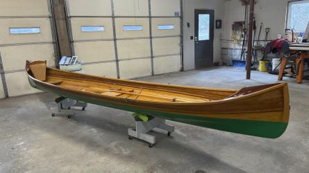 New Adirondack Guide Boat for Sale, on stands, inside 1