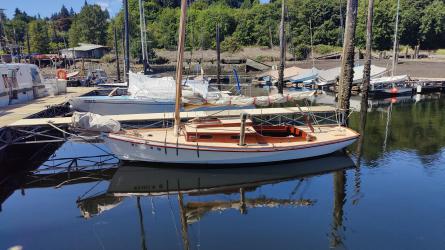 Ed Monk Sloop, docked port side view
