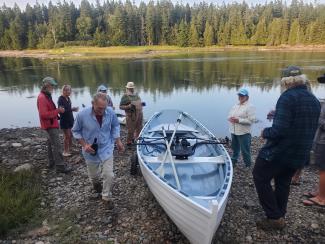 Passing the champagne around before launching.