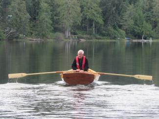 Lee Cormie rows his son's boat 