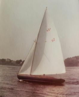 1920 Herreshoff S Boat in need of restoration, in water undersail port side view