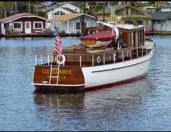 1929 44'  bridge deck cruiser, stern view in water