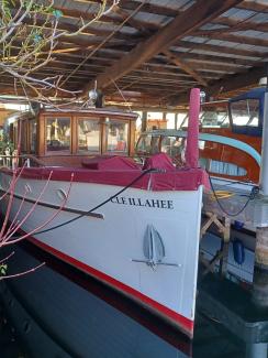 1929 44'  bridge deck cruiser, docked bow view