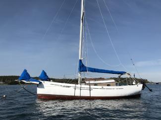 1990 Lyle Hess Cutter, in water on mooring starboard side view