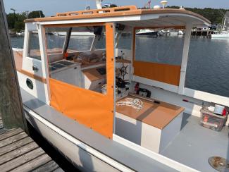 30' Ralph Stanley Classic Lobster Cruiser, docked port side, view of wheelhouse from dock