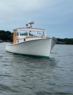 30' Ralph Stanley Classic Lobster Cruiser, in water looking at bow starboard side