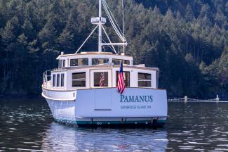 Stunning Pilot House Trawler, in water stern view