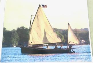 Classic Phil Bolger 20' Chabacco, in water underway