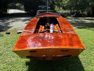 GERBER ALL-VARNISHED WOODEN SNIPE SAILBOAT, on trailer view looking from stern to bow