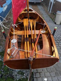 Classic Captain's Gig, on trailer looking above to inside boat