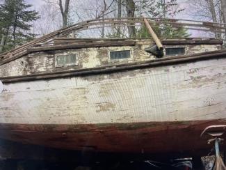  JOHN ALDEN DESIGNED CATBOAT , on the hard starboard view