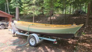 No Mans Land Boat Mirth, on trailer startboard side view