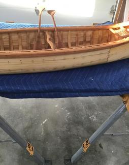 1/4 wooden plank canoe, side above