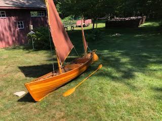 "Piccolo" 12' 8" Sailing Canoe and Model, on the grass, sail