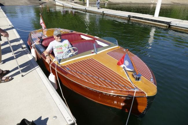 1953 Chris Craft speed boat, docked starboard bow view