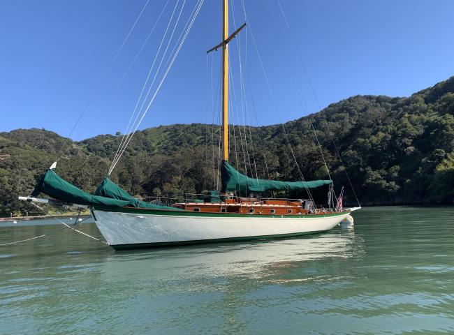 Freelance 38' wooden cutter, in water port side view