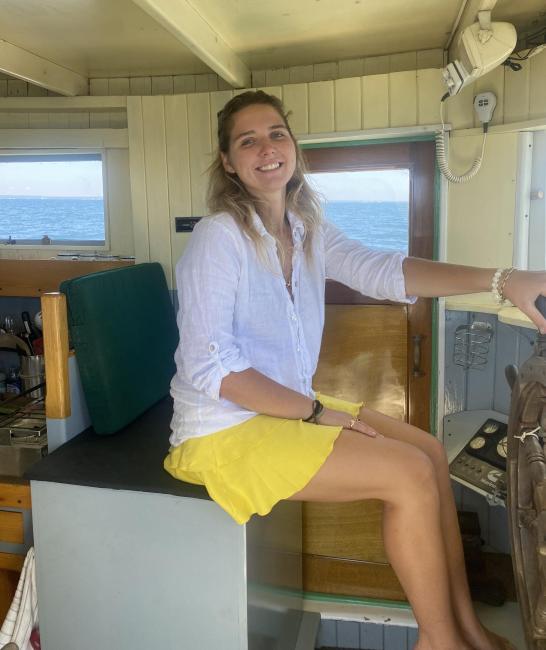 Biloxi Lugger "Southern Grace", smiling at the wheelhouse