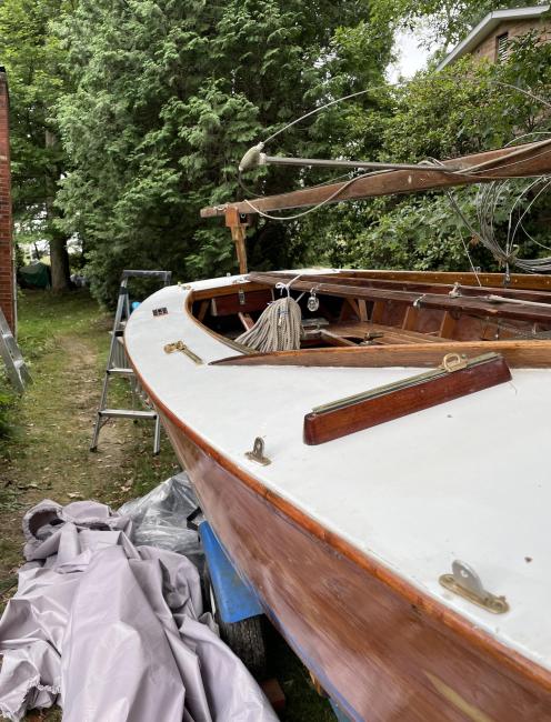 Boat for sale, 19' Lightening  sailboat, on trailer up close port side looking toward bow