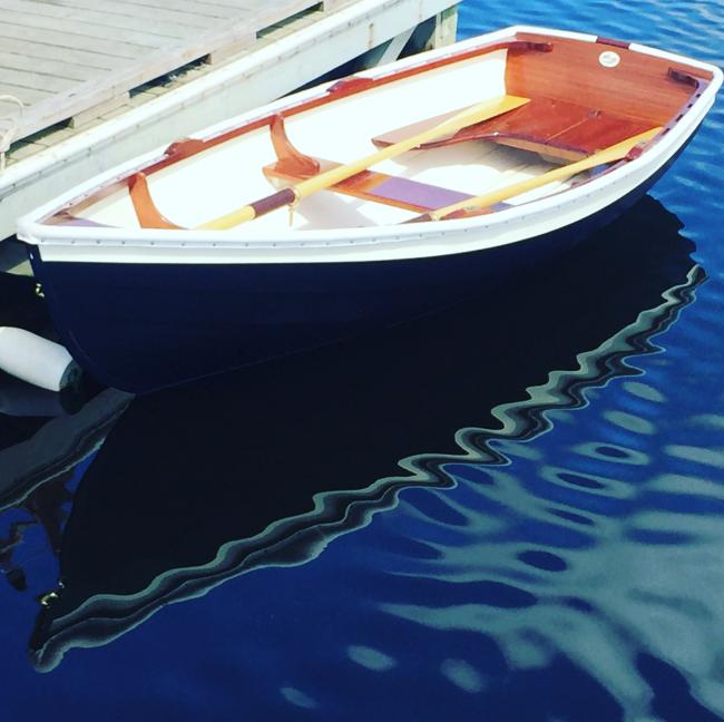 Cottrell Boatbuilding Chaisson Dory, in water port side view