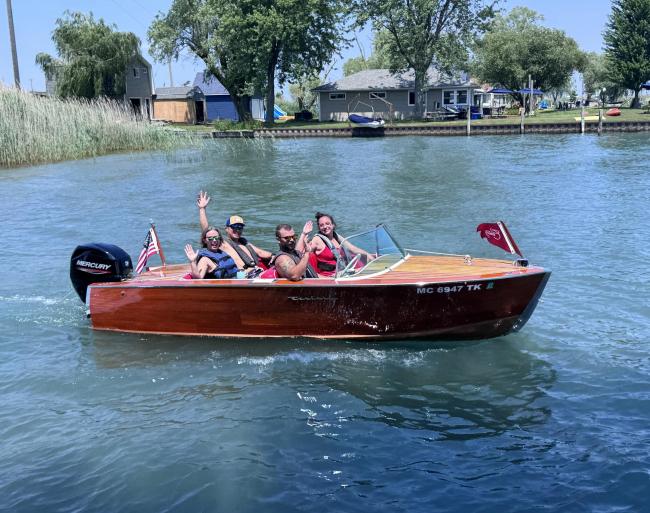 Classic 1956 Century Palomino Runabout 15', in water starboard side view
