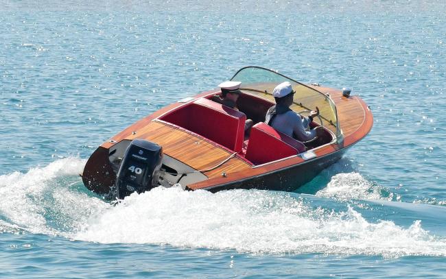 Classic 1956 Century Palomino Runabout 15', underway stern starboard side view