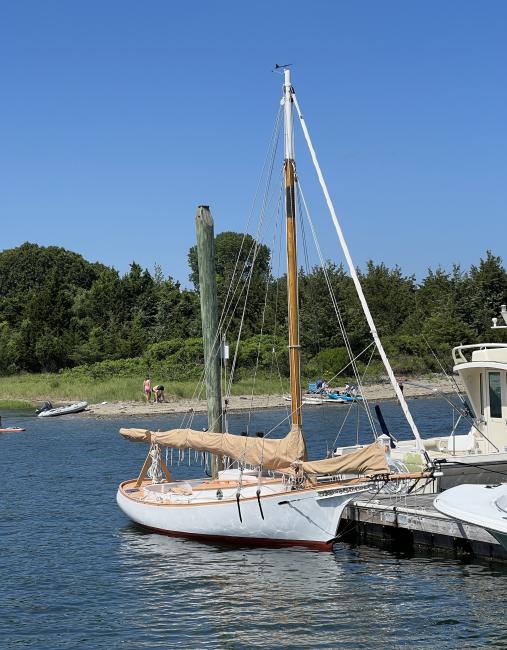 "ECHO" 1965 Friendship Sloop, docked in water bow starboard side