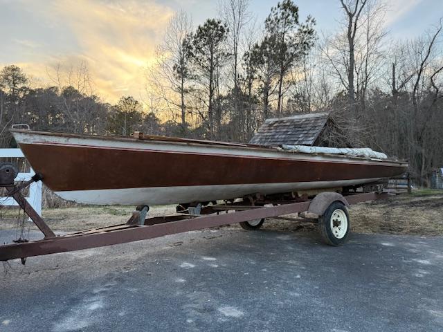 1967 Von Hacht Flying Dutchman 20'. on trailer sunset behind