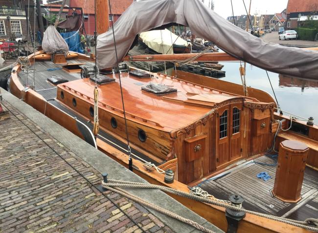 GROOTE BEER, classic flat bottomed Dutch Botteryacht, docked port side view of deck