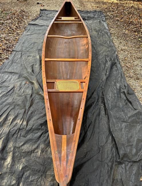 Handcrafted Cedar Strip Canoe- 18 ft, full view, on ground