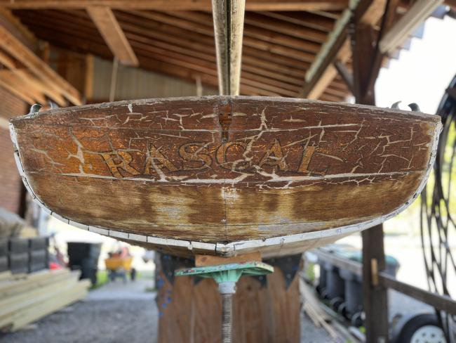 Wooden ballast keel sloop "RASCAL", on stands inside view of transom