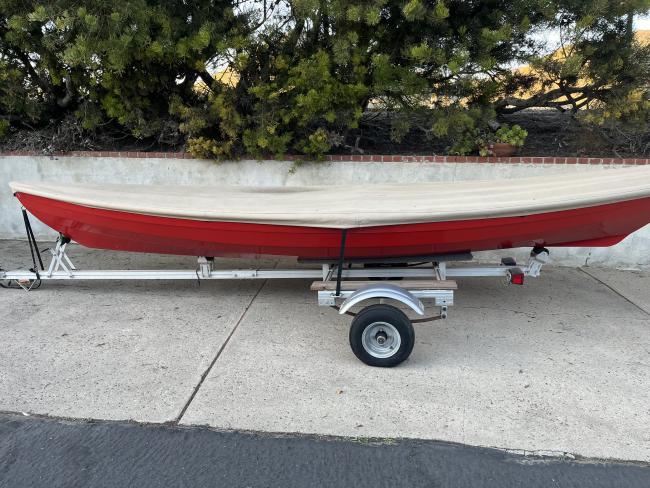 Beautiful Handmade Dory, trailored on the hard