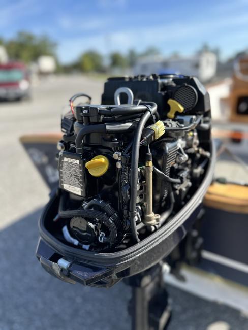 CLC Peeler Skiff 16', Tohatsu 15-hp outboard motor, cover off view