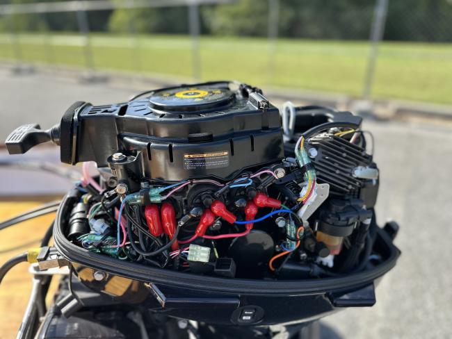 CLC Peeler Skiff 16', Tohatsu 15-hp outboard motor, cover off view